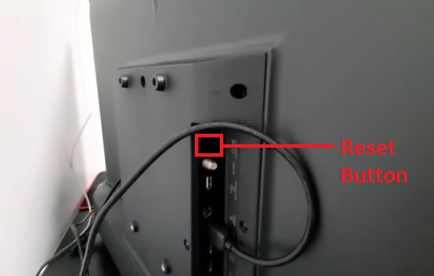 Tiny reset button